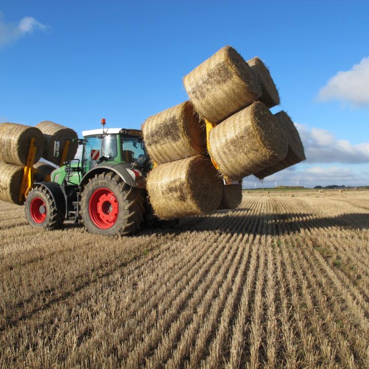 Octa-Quad Bale Handling System - front and rear sections for carrying 12 round bales at a time.